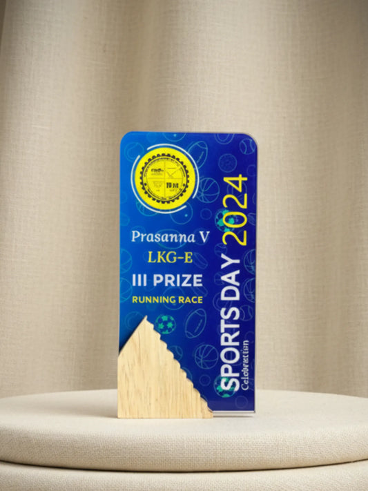 Sports day award plaque with blue background and text on a beige surface