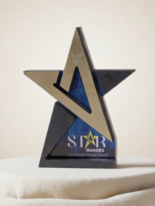 Star-shaped award with 'STAR Makers of Yorkshire Global School' logo on a white surface.