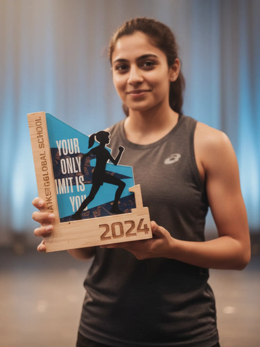 Premium sports day trophy with running figure and first place engraved base
