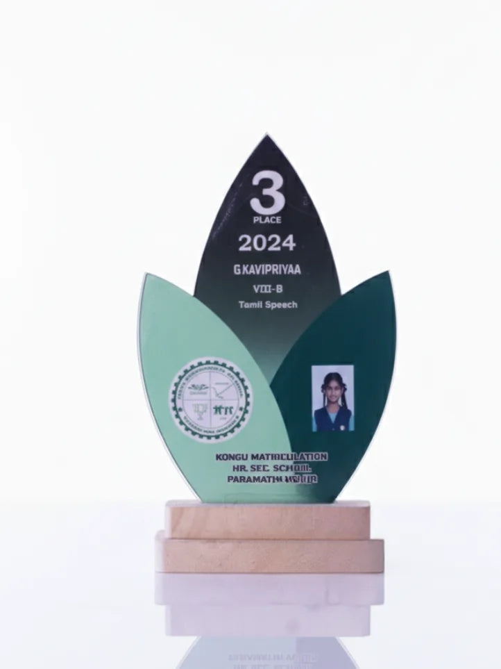 Decorative award with a leaf design, featuring text and a photo on a white background