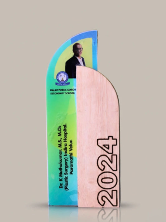 Colorful arch-shaped award with a person's image and '2024' on a gray background