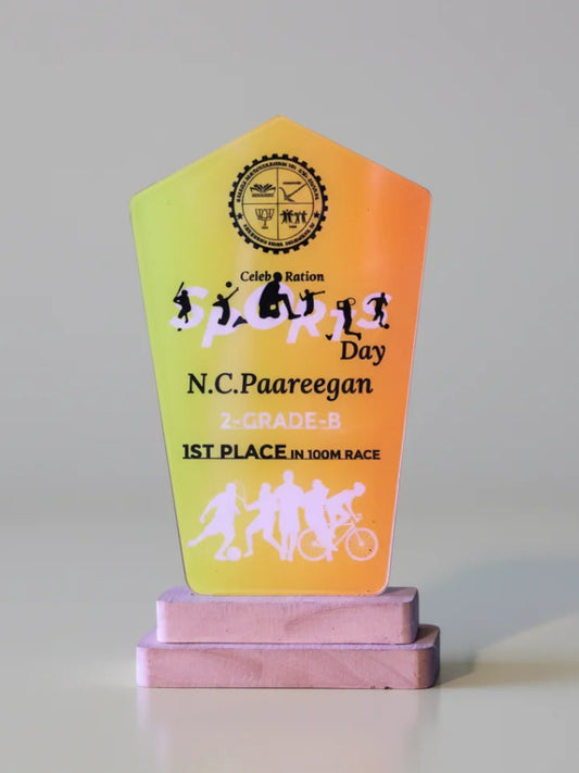 Colorful trophy with text and silhouettes on a gray background