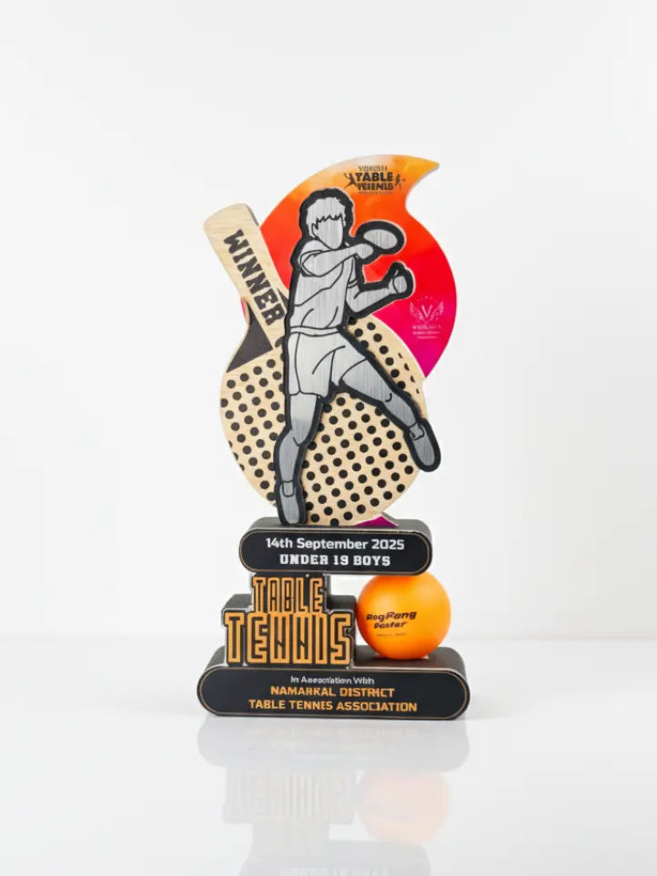 Table tennis trophy with player illustration and ball on a white background