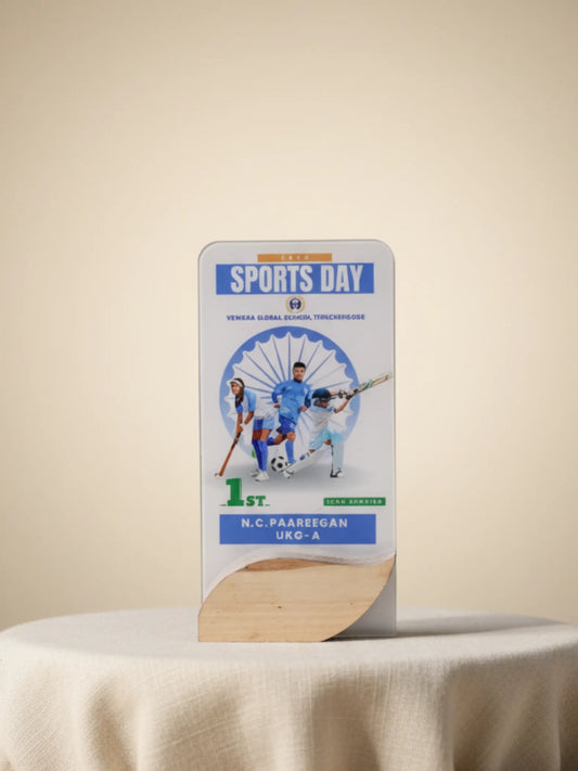 Sports day champion trophy with golden figure and engraved nameplate