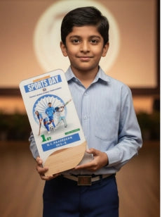 Child holding a sports kit box with a blurred background