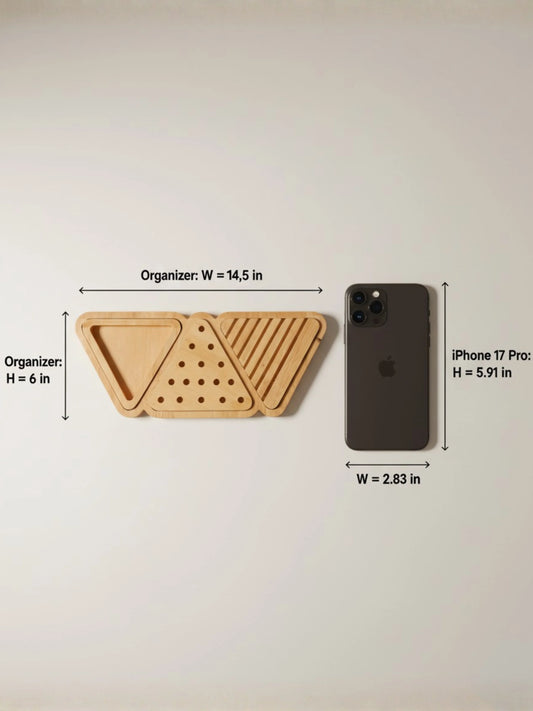 Wooden organizer with dimensions labeled next to an iPhone 17 Pro Max on a white background