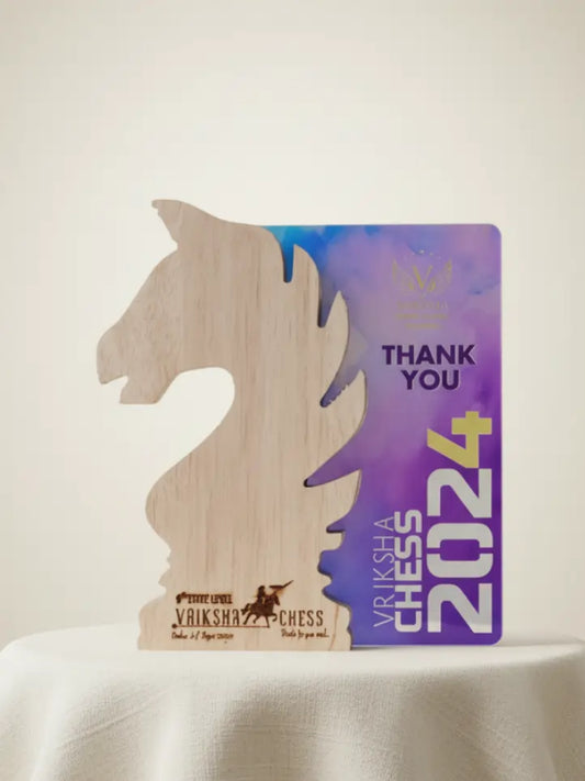 Wooden chess piece with a purple plaque on a white surface