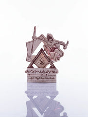 Decorative item with geometric design and figure on a white background