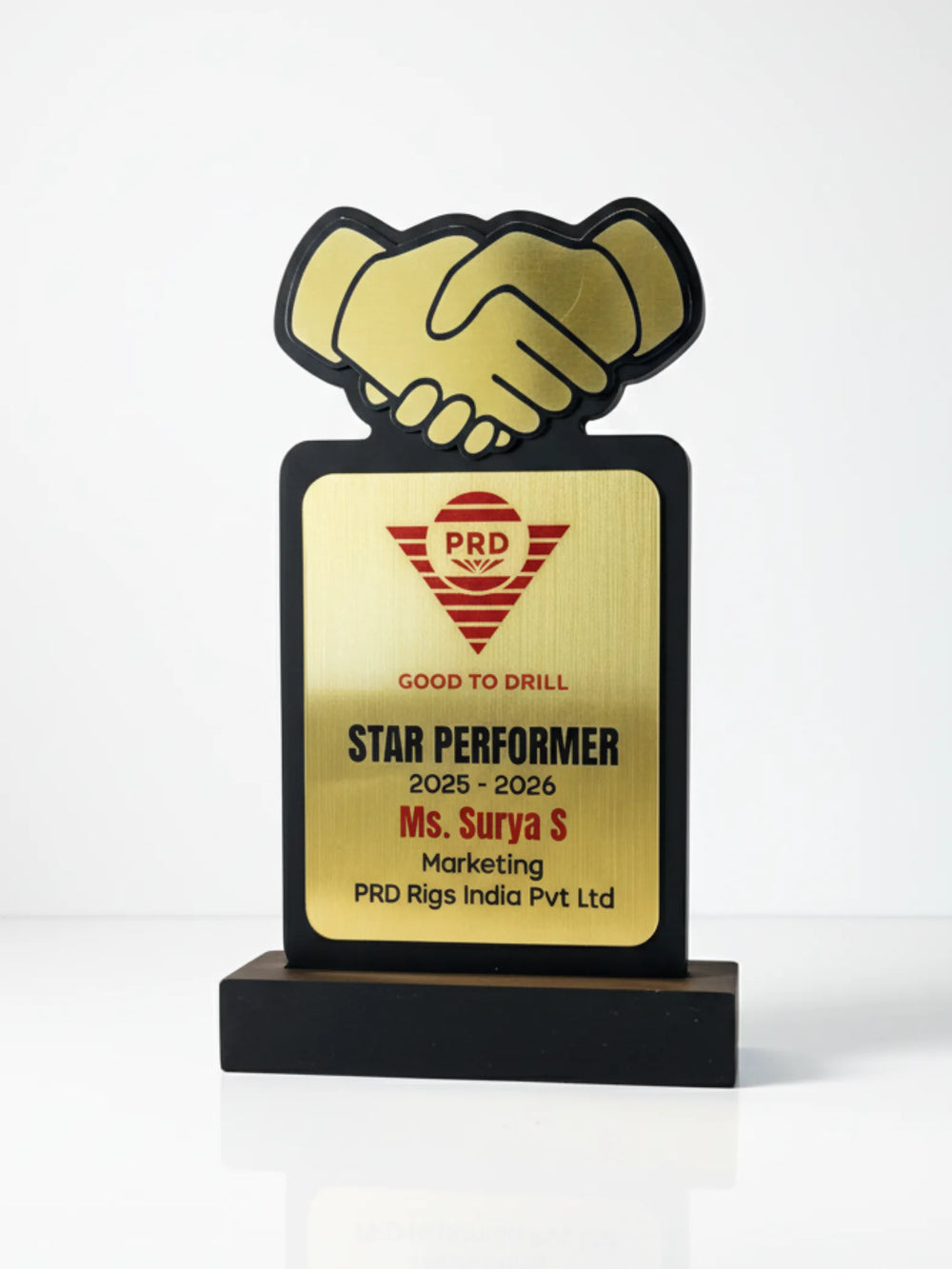Gold star performer award with handshake design on a white background