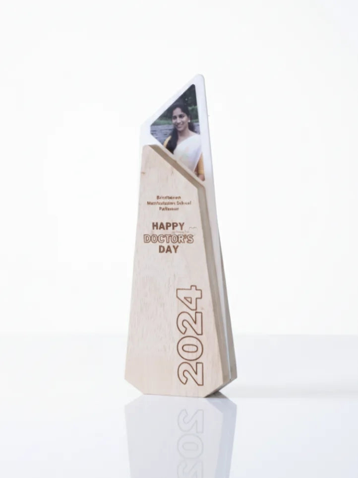Trophy with a photo of a person and 'Happy Doctors Day 2024' text on a white background