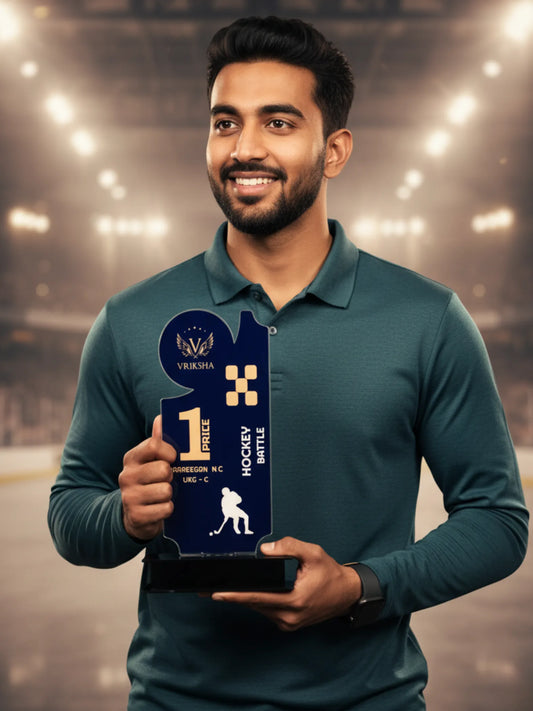 Man holding a trophy with 'Viksha' branding in an indoor sports arena setting