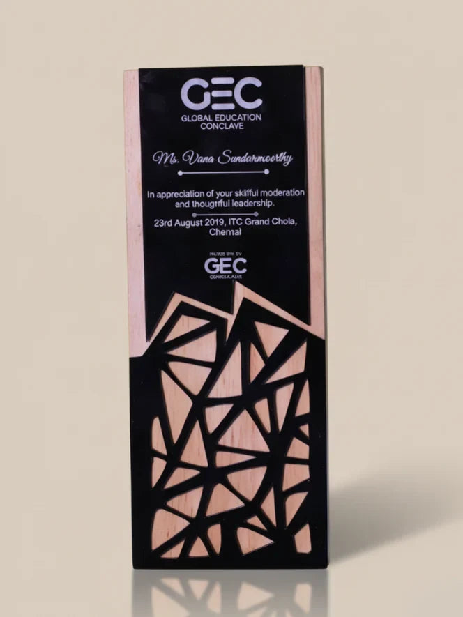 Premium corporate recognition trophies including acrylic trophies, and wooden employee achievement awards