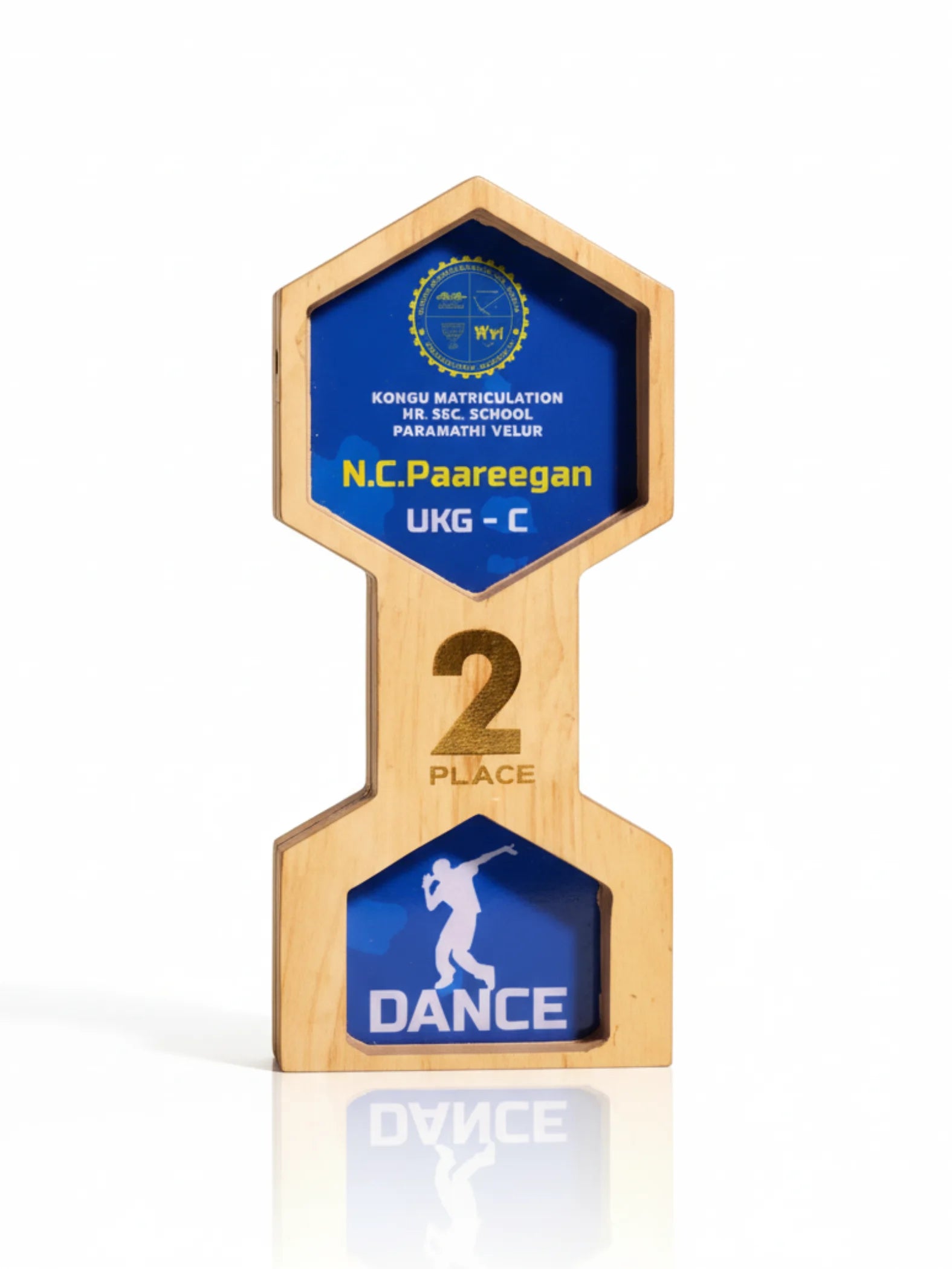 Personalized dance trophy in presentation setting for competition winners and dance recital awards