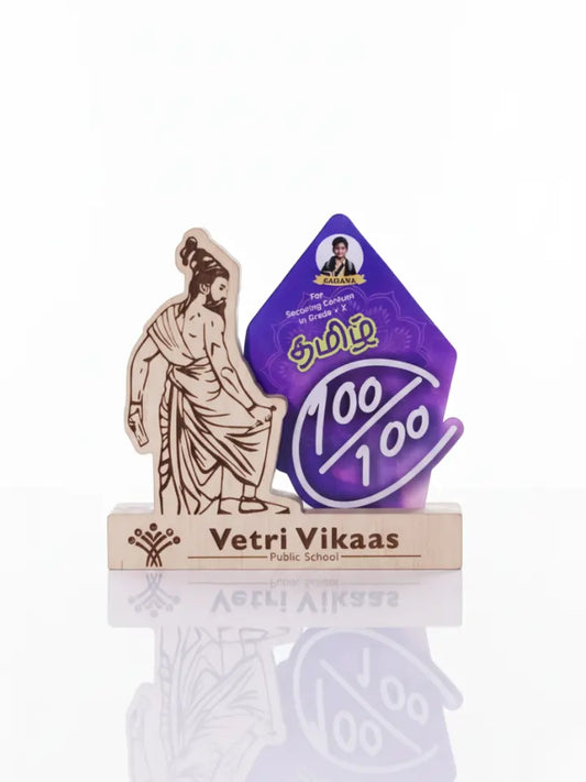 Decorative item with a figure and 'Vetri Vikaas' branding on a white background