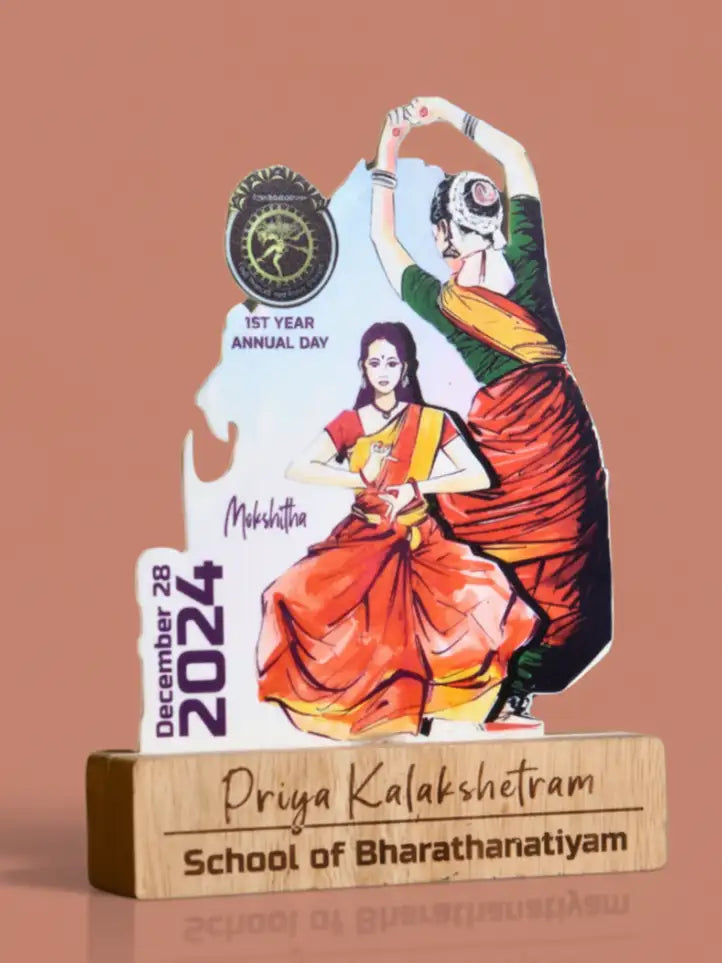 Decorative stand with dancers and text on a brown background