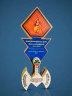 Decorative plaque with a stylized figure and text on a blue background