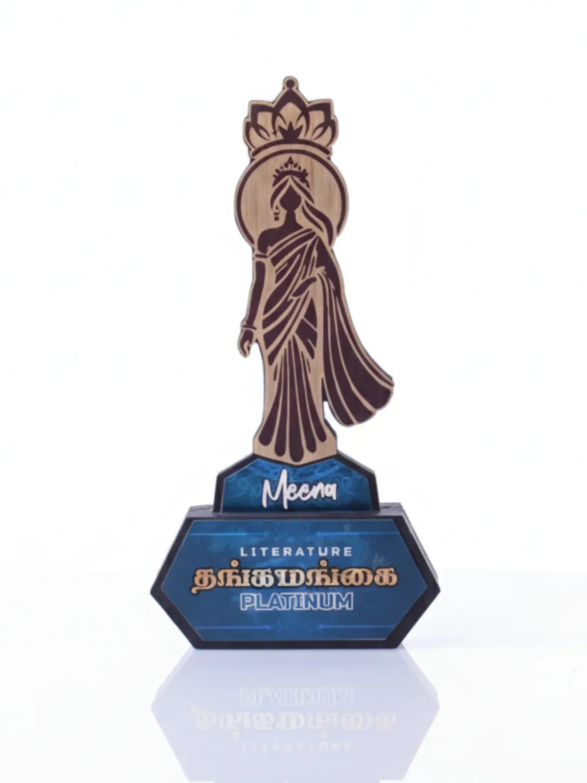 Trophy with a statue on a blue base, featuring text and a logo.
