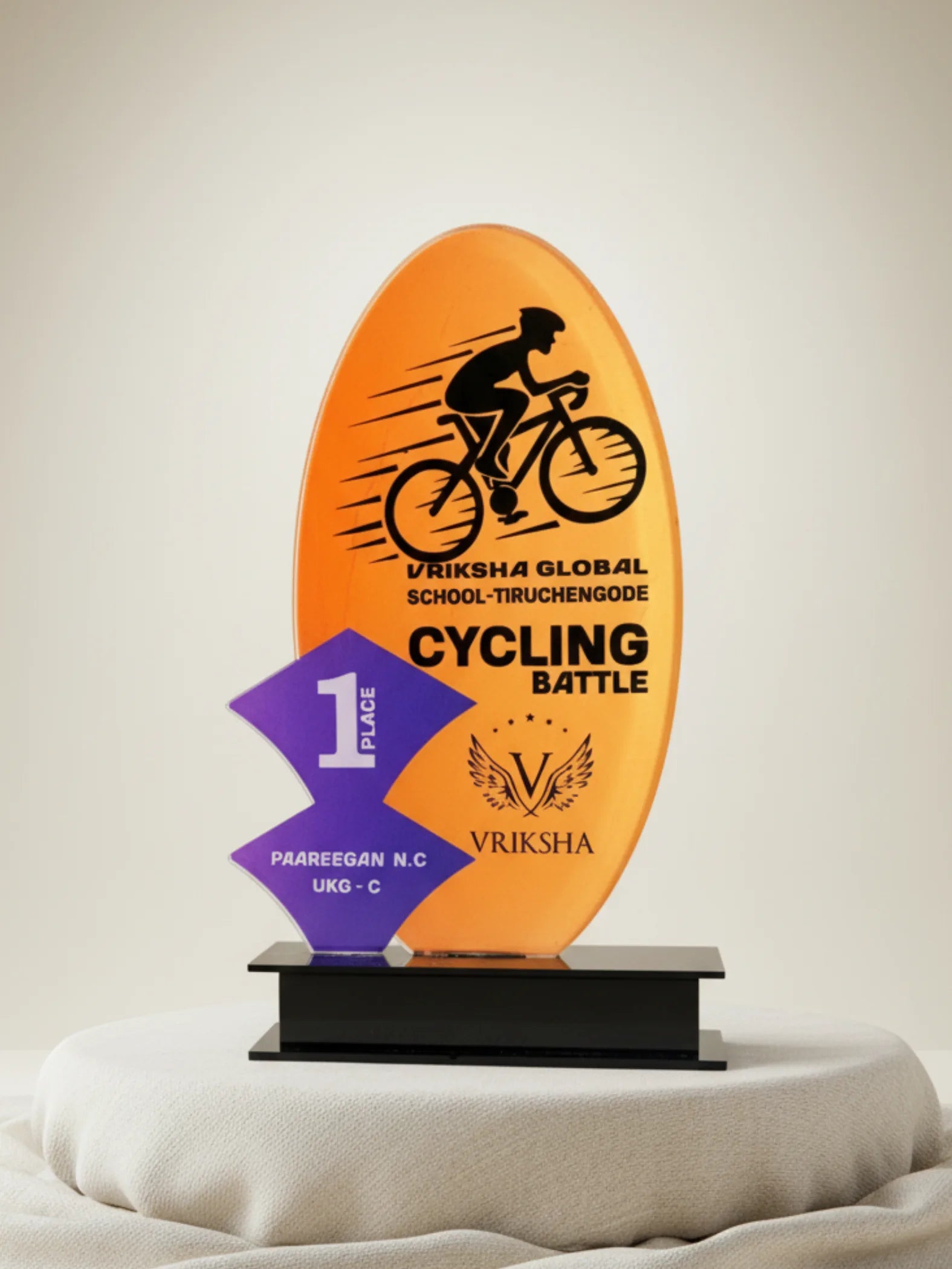 Cycling trophy size comparison showing different personalized award options