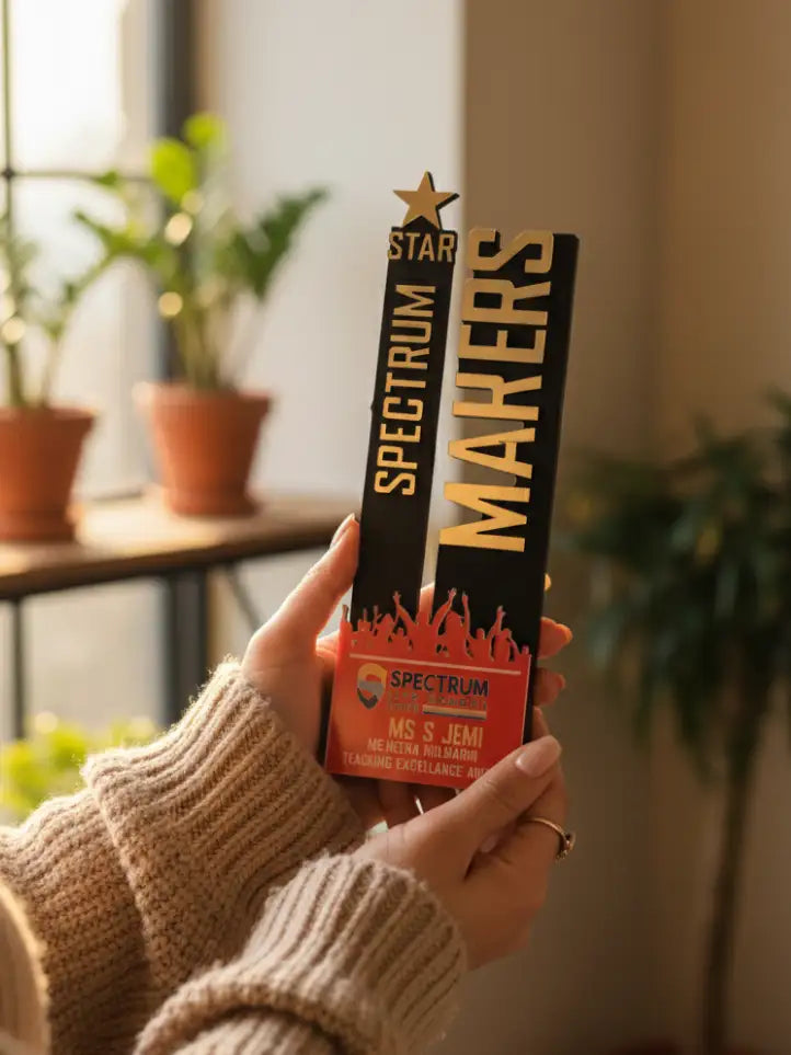 Person holding a Spectrum Makers product with plants and a window in the background