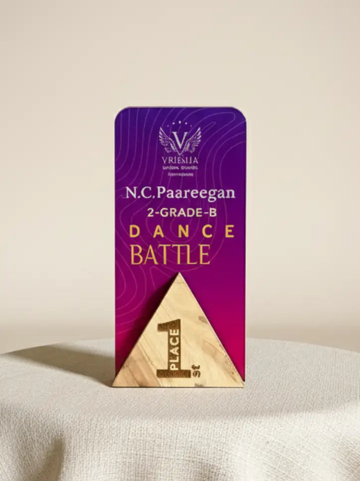 Purple and gold trophy for a dance battle with 'Vrishab' branding on a beige background