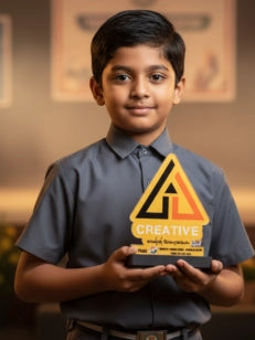 Child holding a sign with 'Creative' branding against a blurred indoor background