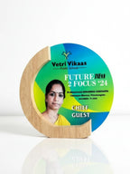 The trophy displayed on an event table with celebratory decorations, suggesting its use in formal recognition ceremonies.