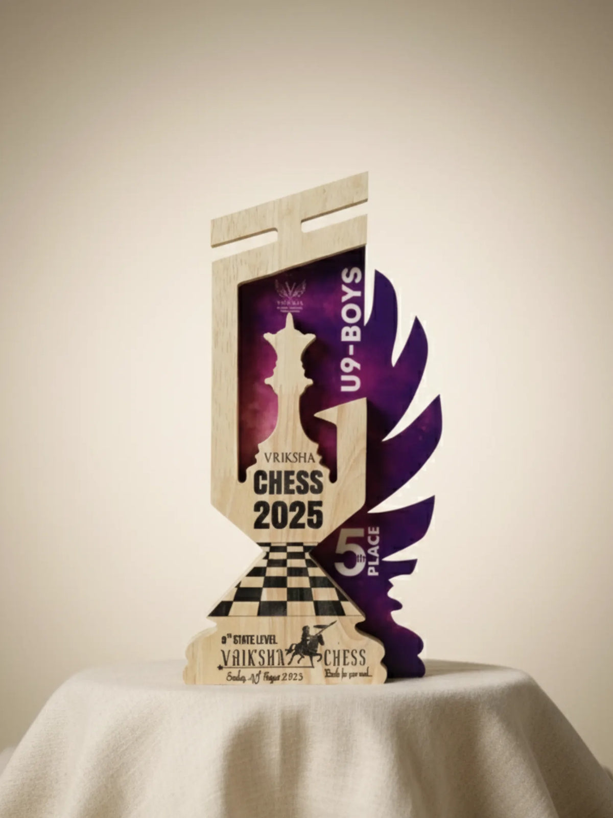 Chess queen trophy size comparison showing different award options available