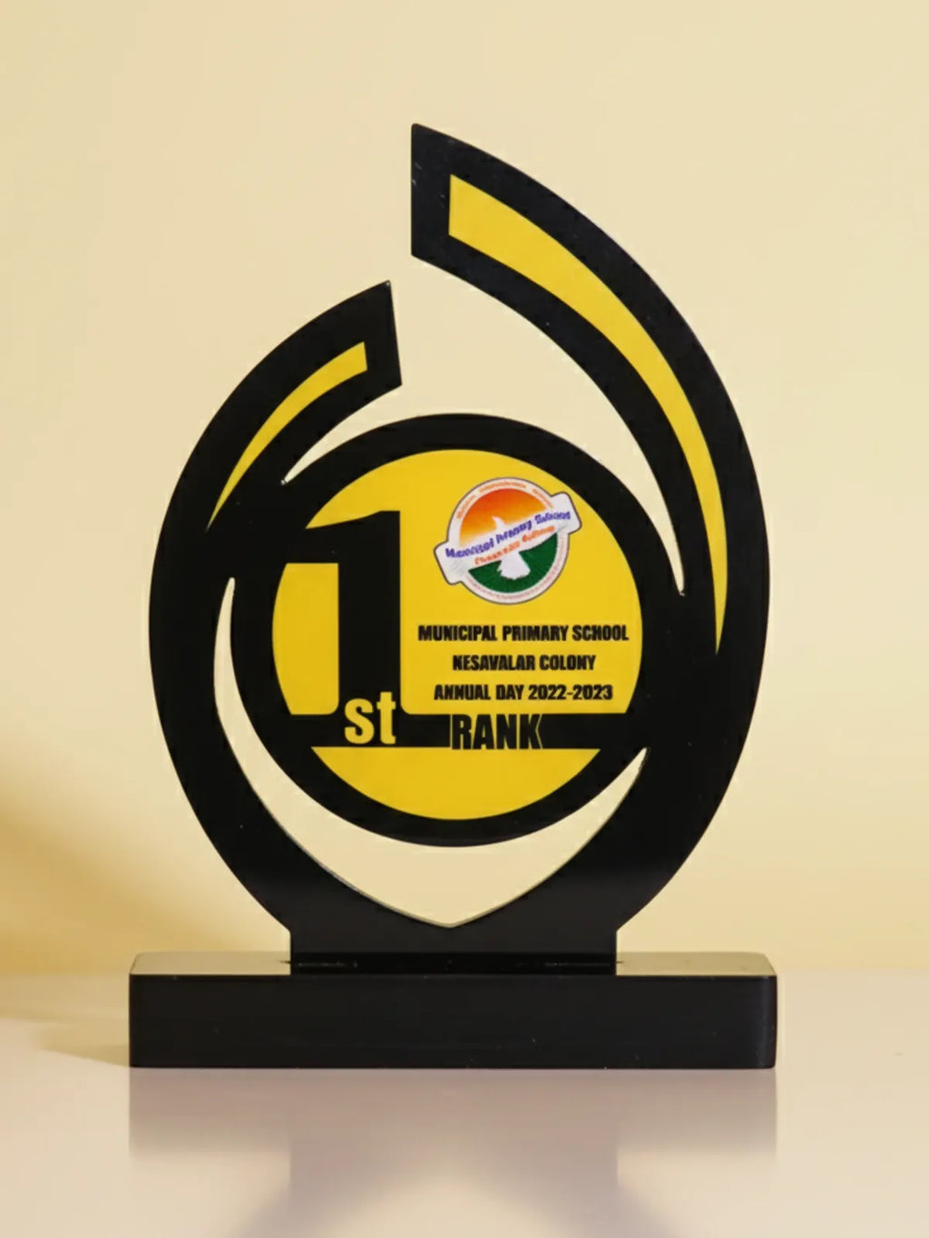 Awards trophy with '1st Rank' text and a logo on a beige background