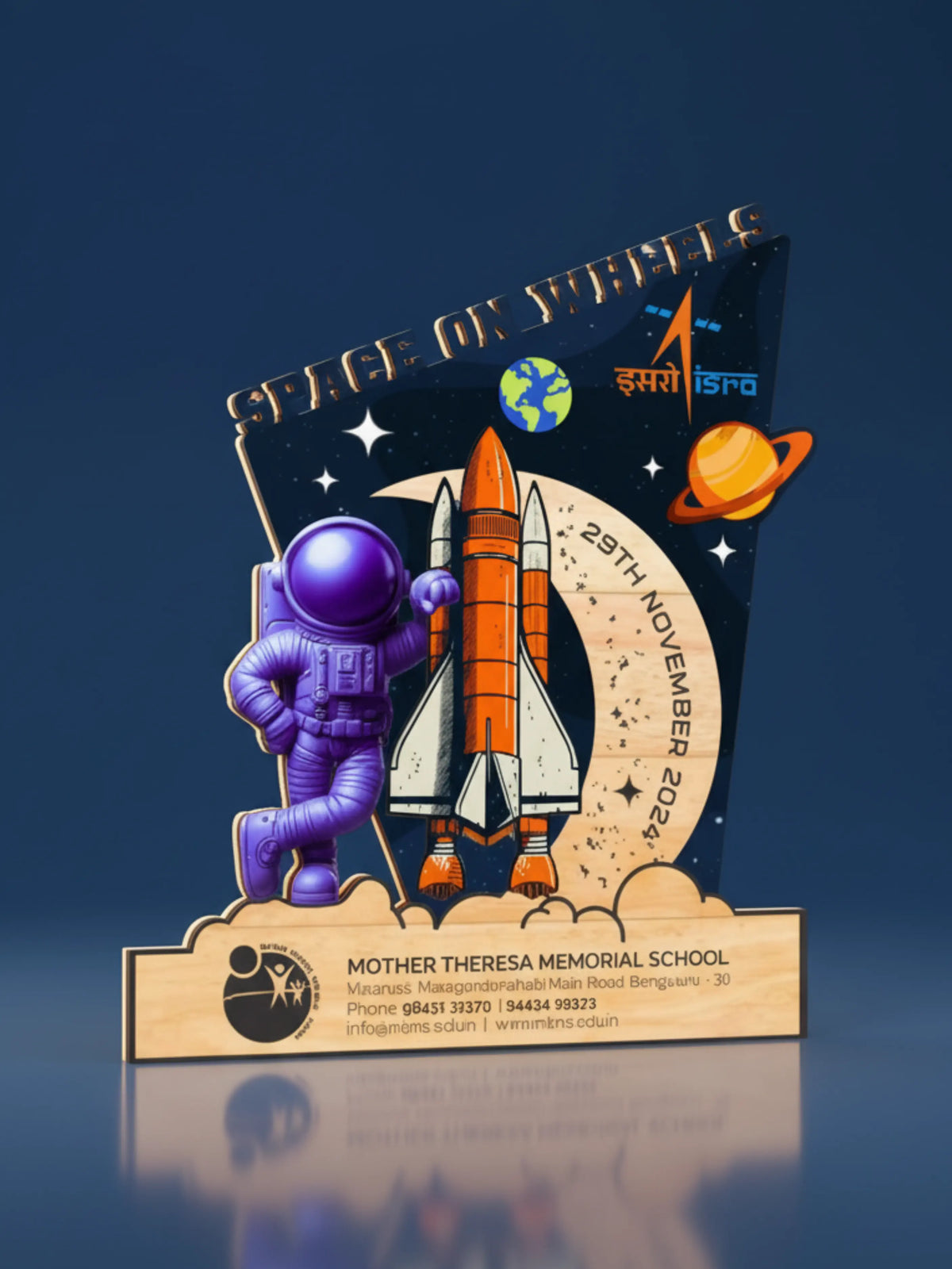 Educational display with an astronaut, rocket, and celestial elements on a dark blue background