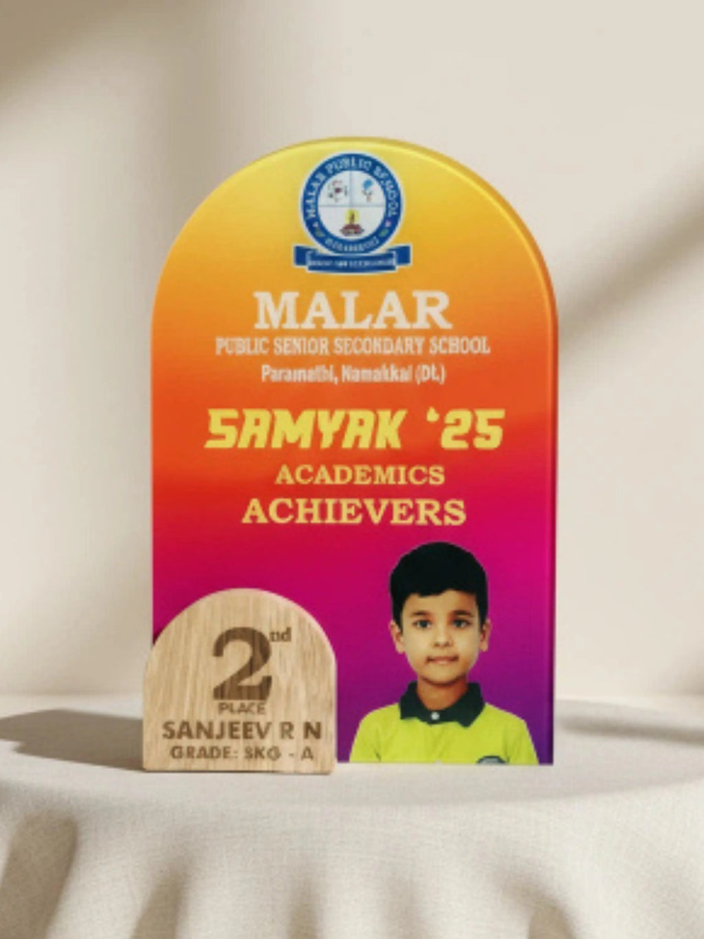 Academic achievement award for Malar Public Senior Secondary School with a child's photo and text on a beige background