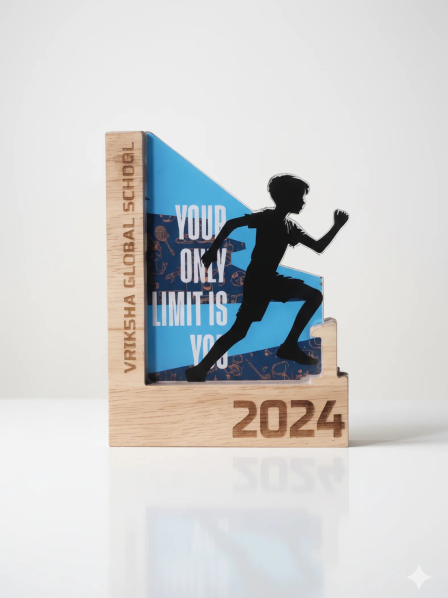 Wooden plaque with a silhouette of a runner and motivational text on a white background