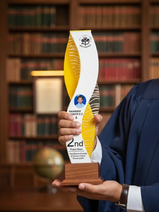Person holding a trophy with a bookshelf background