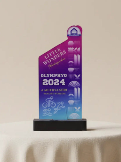Decorative award with 'Little Wonders Olymphyo 2024' text on a beige background