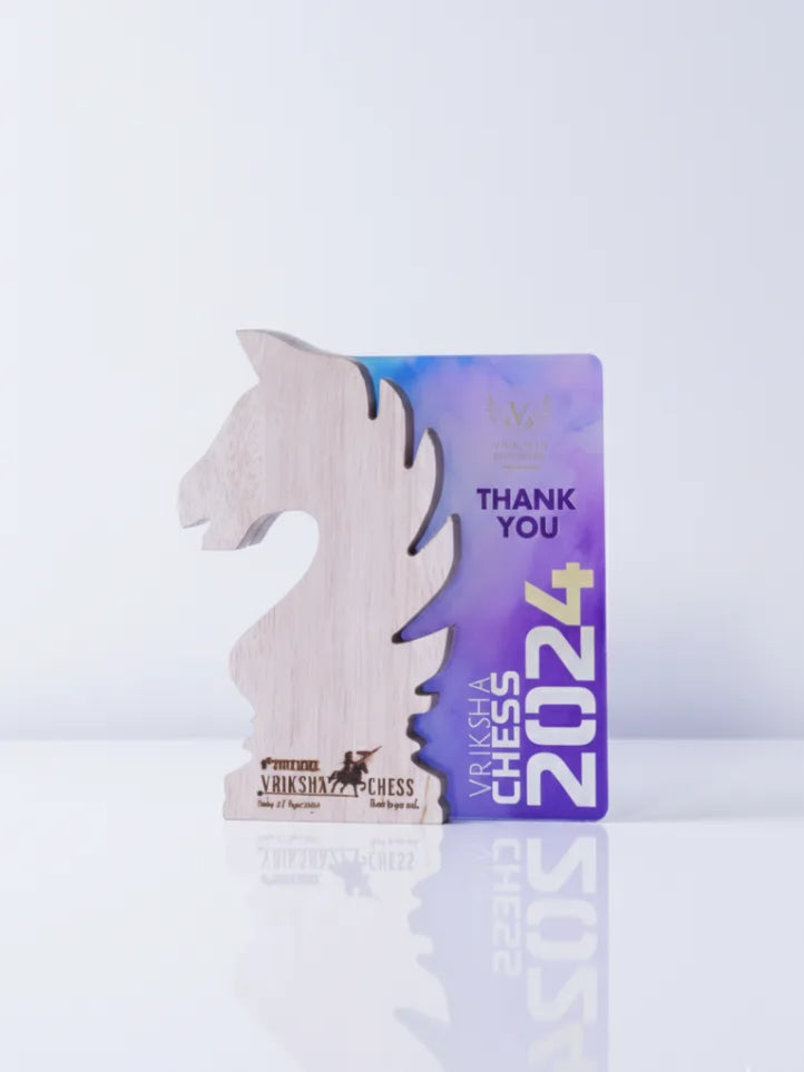 Chess piece with a 'Thank You 2024' card on a white background