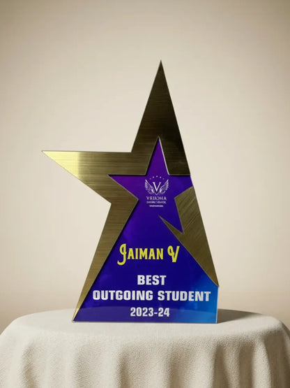 Star-shaped award with 'Gaiman' and 'Best Outgoing Student 2023-24' text on a beige background
