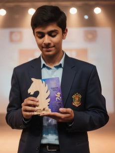 Person in formal attire holding an award with a blurred background