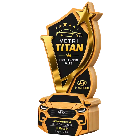 Angled view of Vetri Titan sales excellence trophy with gold-tone star and car-shaped base