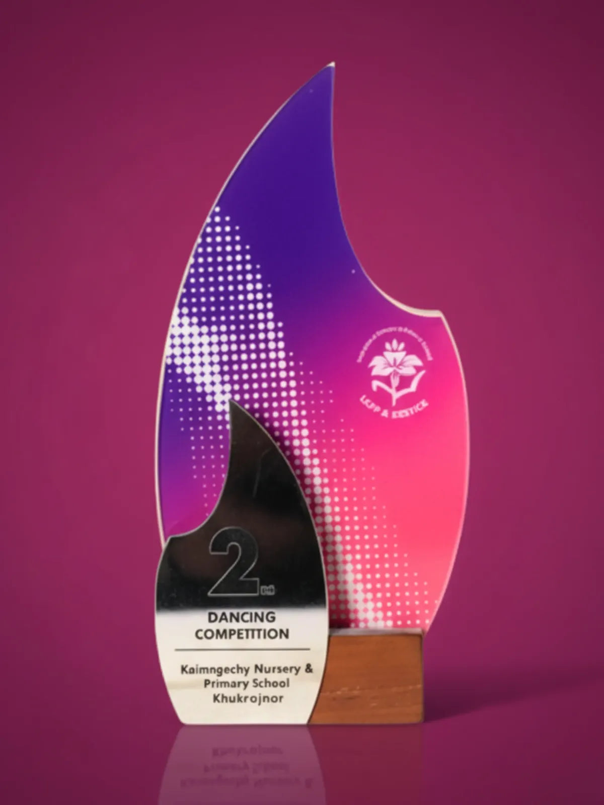 Decorative award with a flame design on a purple background