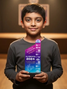 Child holding a colorful book titled 'Apple Awards 2024' in an indoor setting.