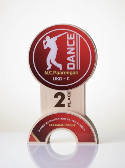 Dance competition trophy with red and white design on a white background