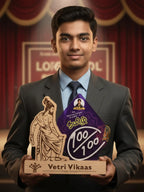 Man in a suit holding an award with 'Vetri Vikaas' on a stage-like background