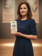 Woman holding a product package in an indoor setting