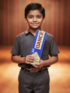 Child holding a dance certificate with a red curtain background