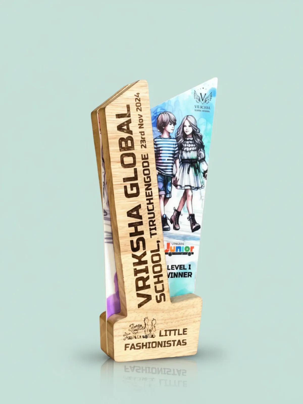 Wooden award with a printed design on a light blue background