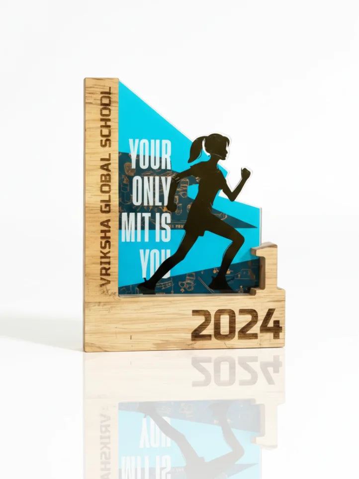 Trophy with a running silhouette and text on a reflective surface