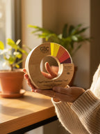 Person holding a GEC award with plants in the background