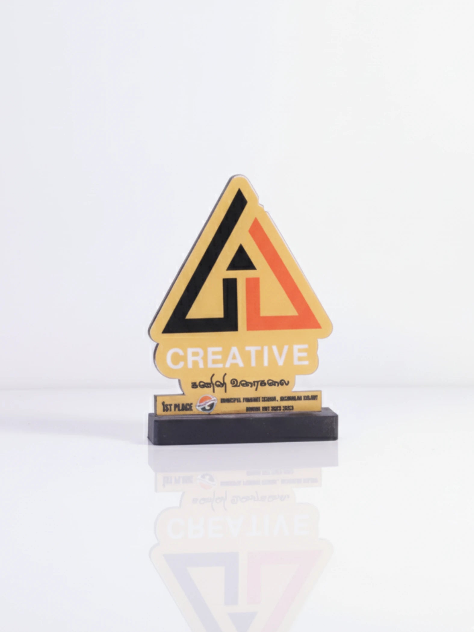 Creative Excellence Trophy displayed in award ceremony setting, perfect for recognizing first place achievements