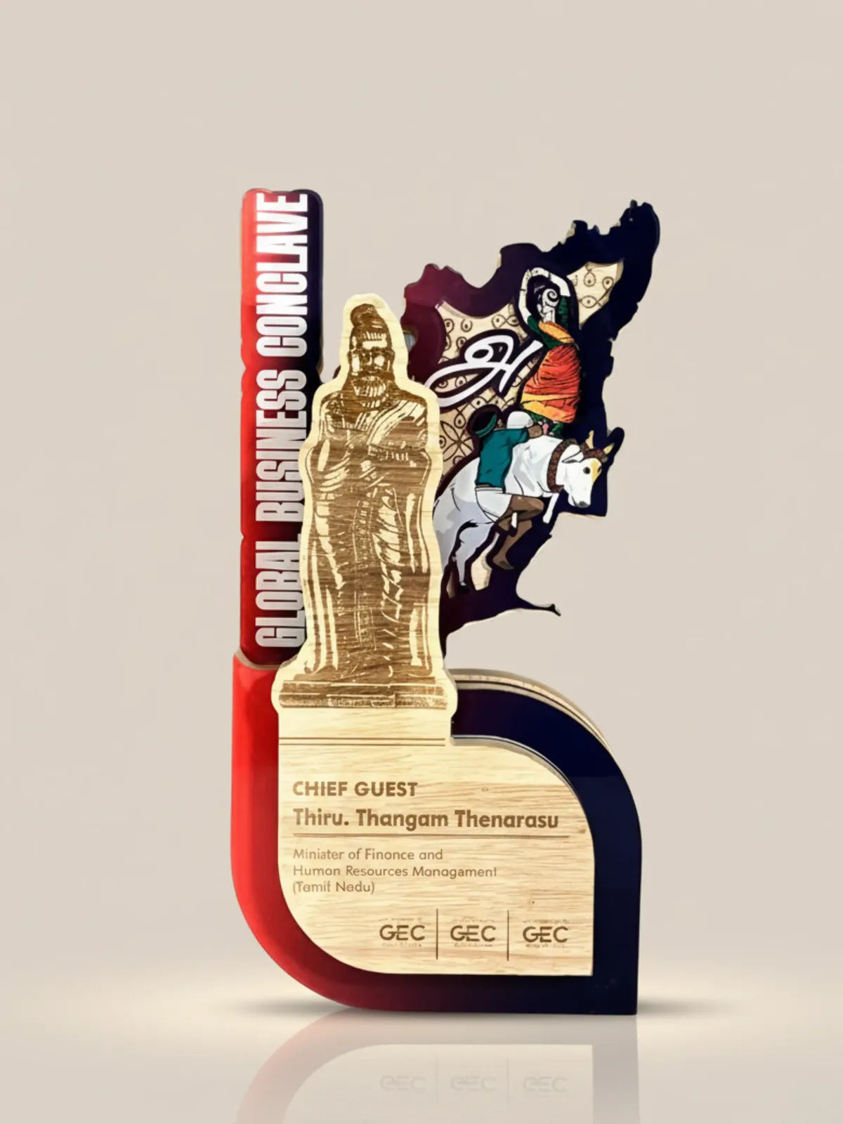 Decorative award with a gold figure and text on a beige background