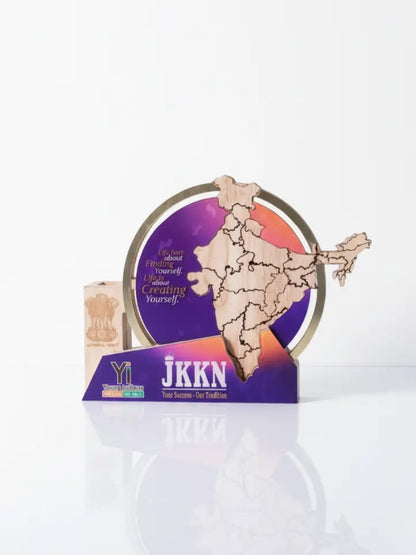 Wooden map of India with a purple label displaying 'JKKN' on a white background