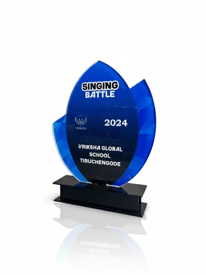 Blue and black award trophy for 'Singing Battle' 2024 at Vriksha Global School Tiruchengode on a white background